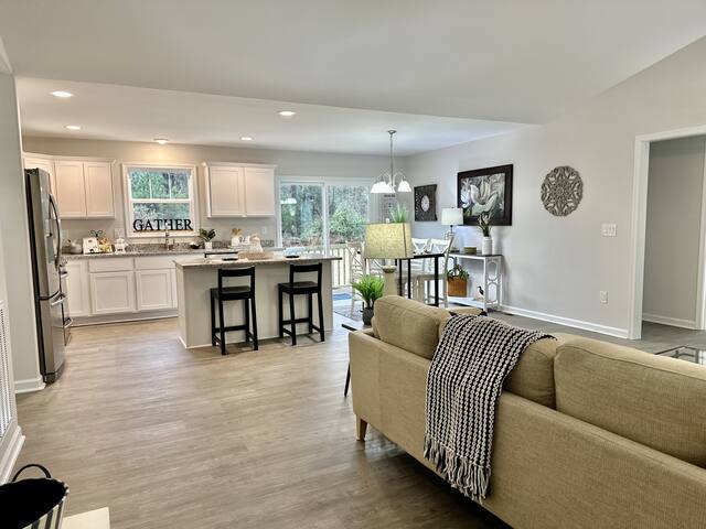 Family room with breakfast bar to kitchen